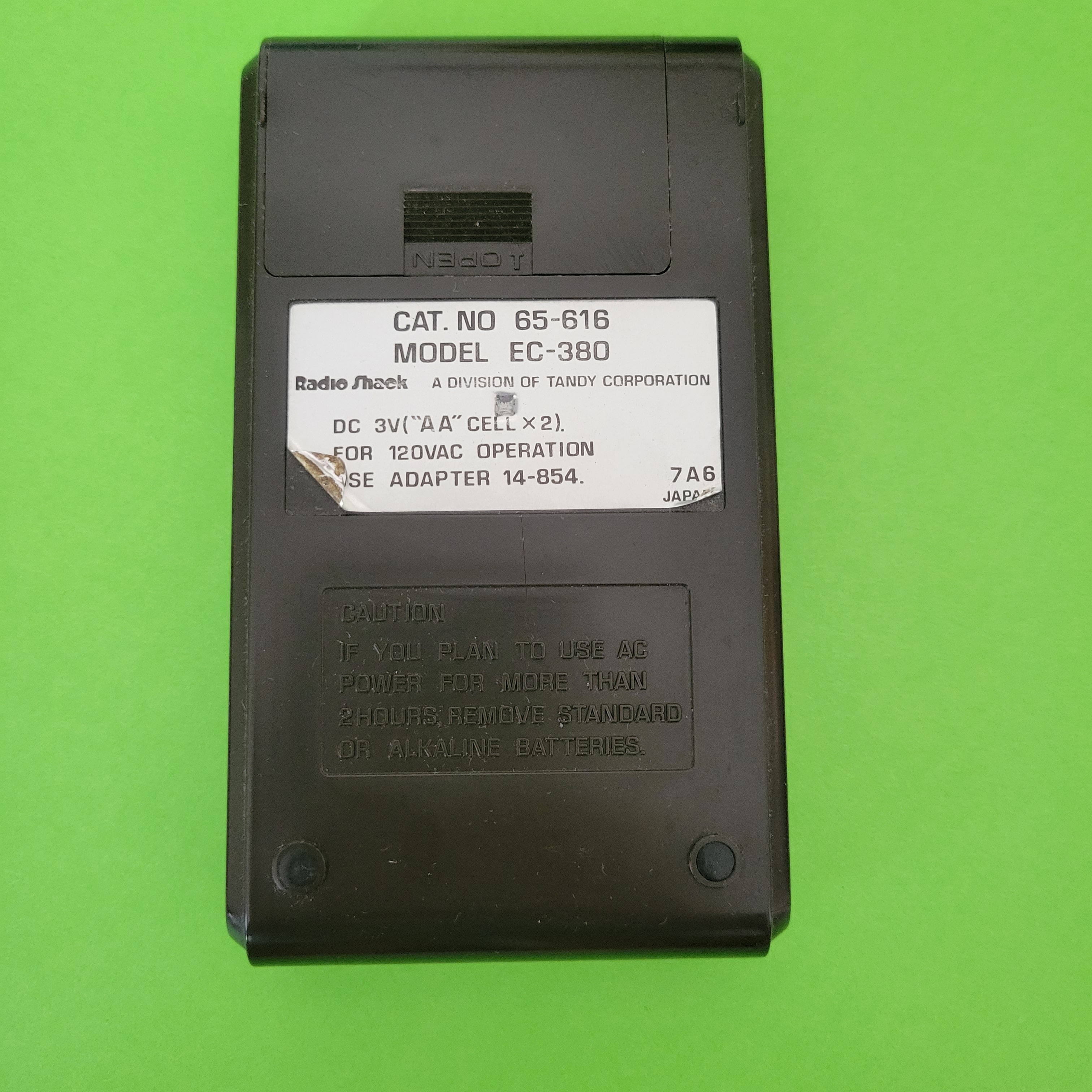 An image of the back of a Radio Shack EC-380 Four Function plus calculator